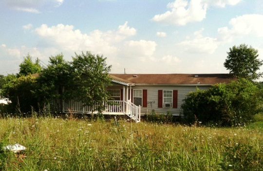 NEW PRICE!! 6 acres and 2500 SF manufactured home, just needs a bit of TLC!