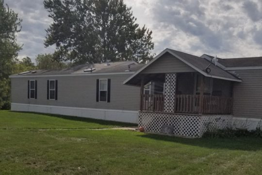 16 x 80 Mobile Home with attached porch & deck